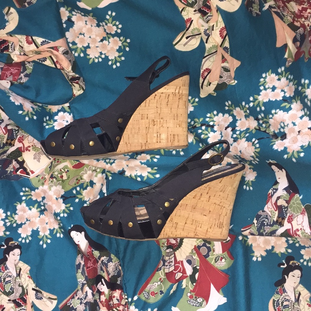 Black canvas Steve Madden sling back wedges.